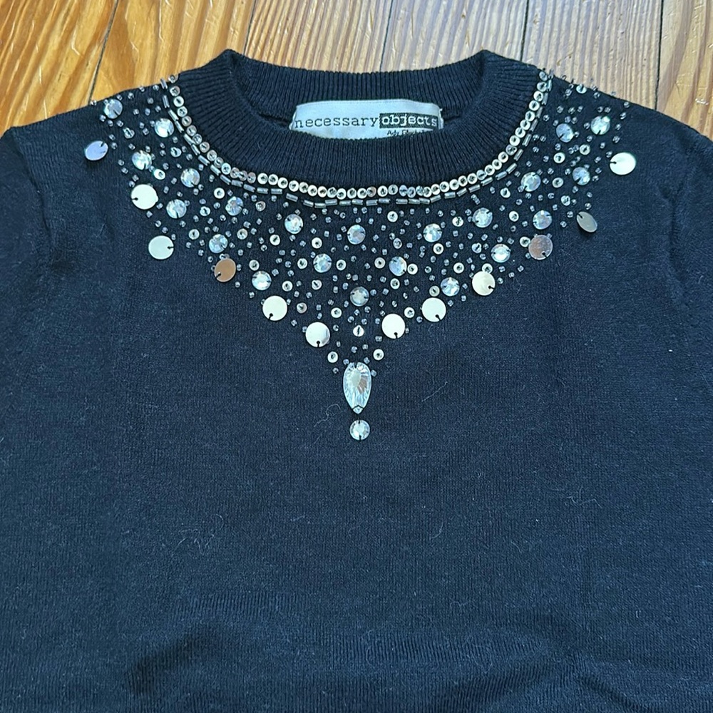 Black short sleeve needed sweater by Necessary Objects. Size small.